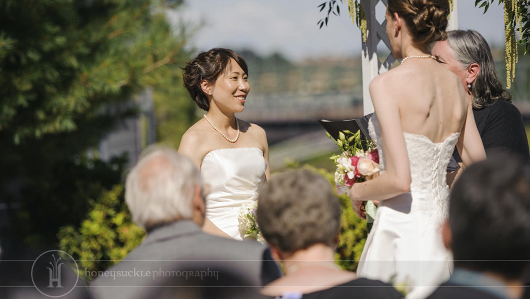 close up of smiling bride at LGBT wedding
