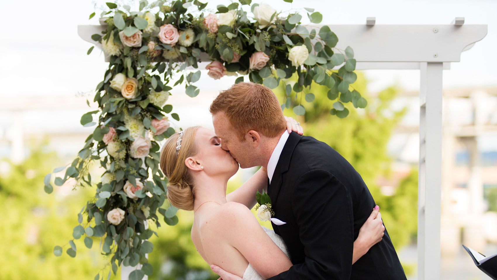 Bride and Groom on the Riverfront Courtyard