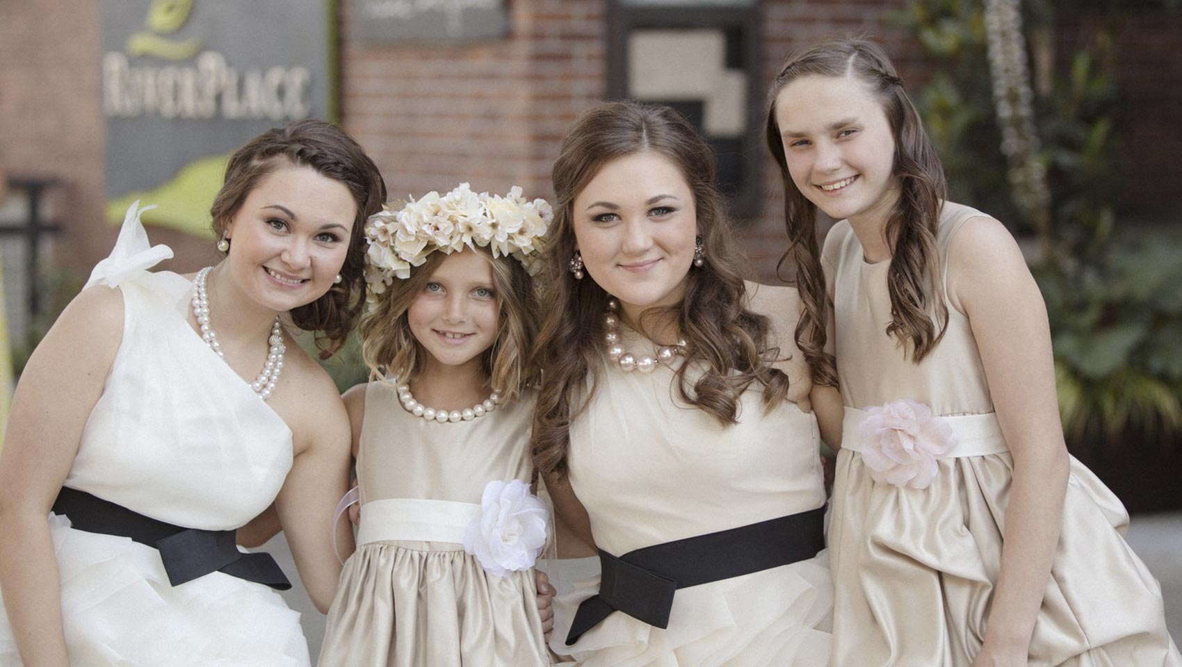 kids posing in group at Riverplace downtown wedding reception