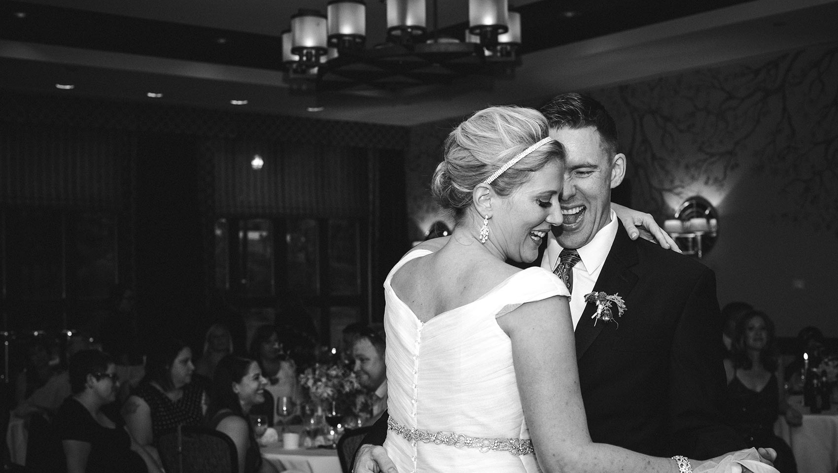 bride and groom dancing at wedding reception