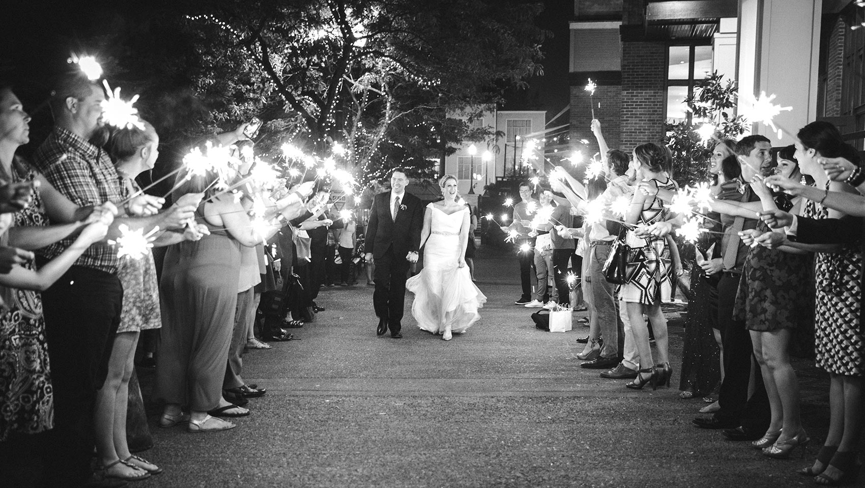 bride and groom walking in Portland downtown wedding reception
