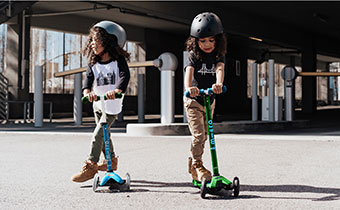 kids riding on Kickboard