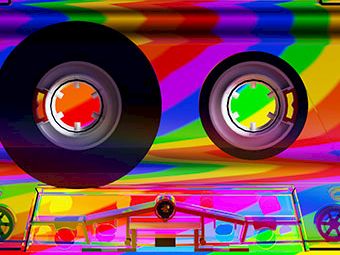 A bright, rainbow-outlined scene with oversized tires, a colorful floor, and a playful abstract background ending the sentence.